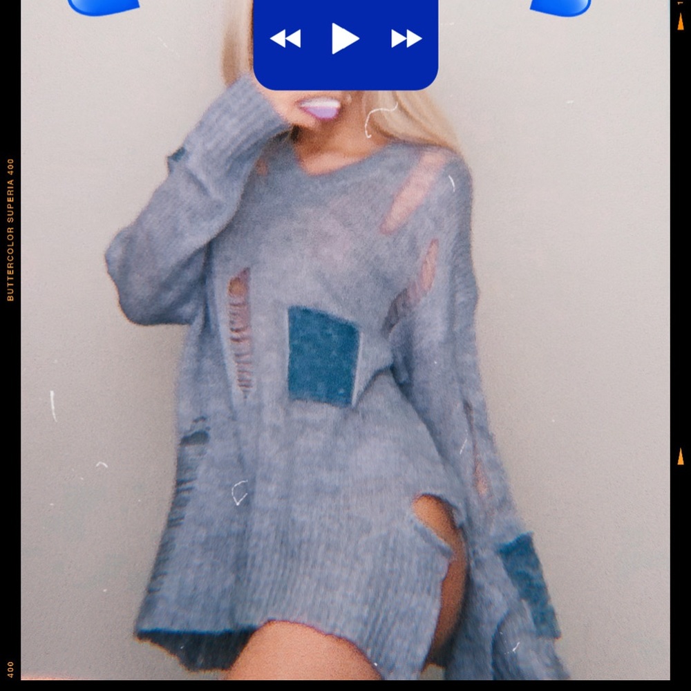 Blue ripped sweater